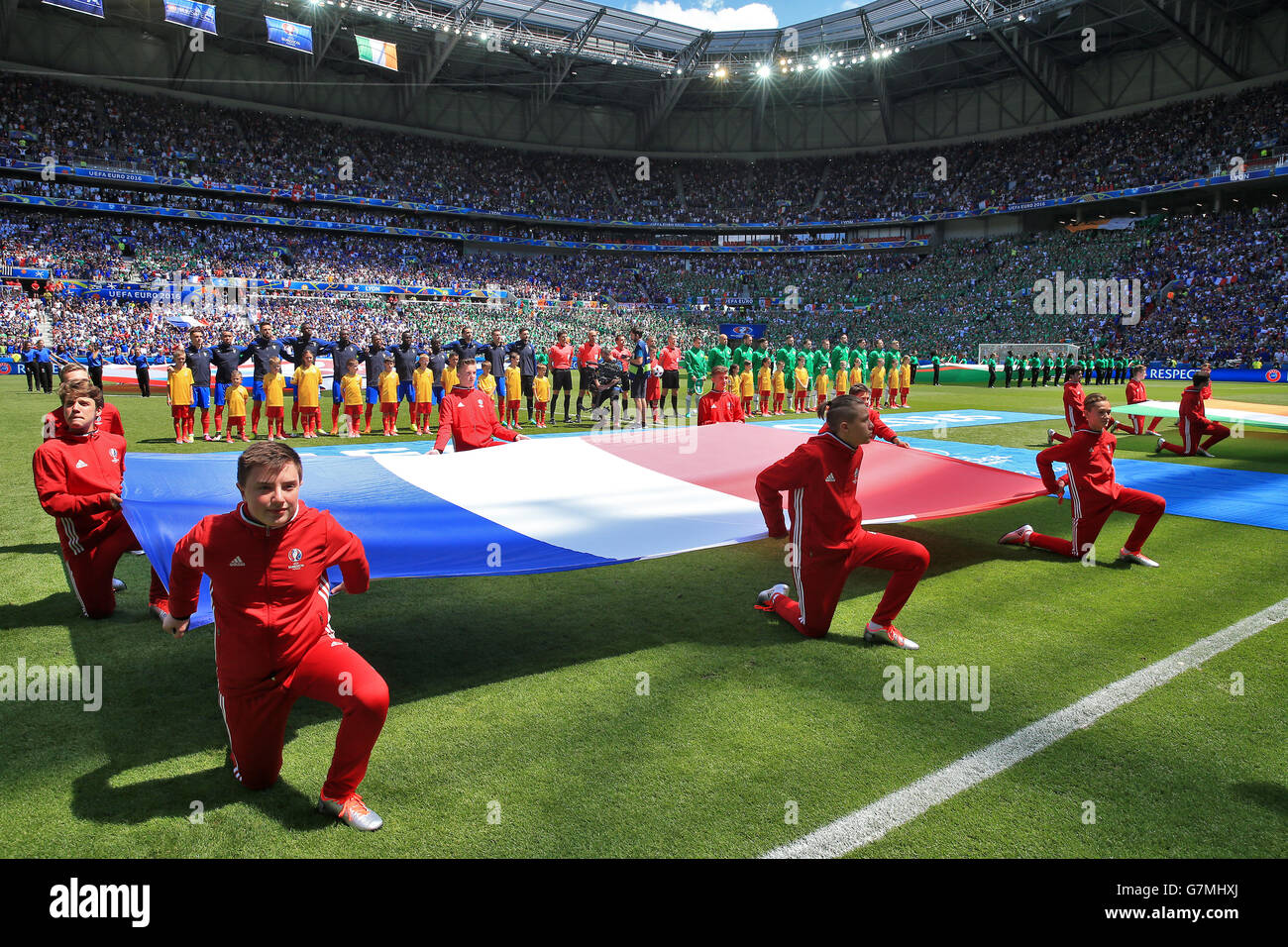 Mascots display the French flag before the round of 16 match at the Stade de Lyon, Lyon. PRESS ASSOCIATION Photo. Picture date: Sunday June 26, 2016. See PA story SOCCER France. Photo credit should read: Nick Potts/PA Wire. Stock Photo