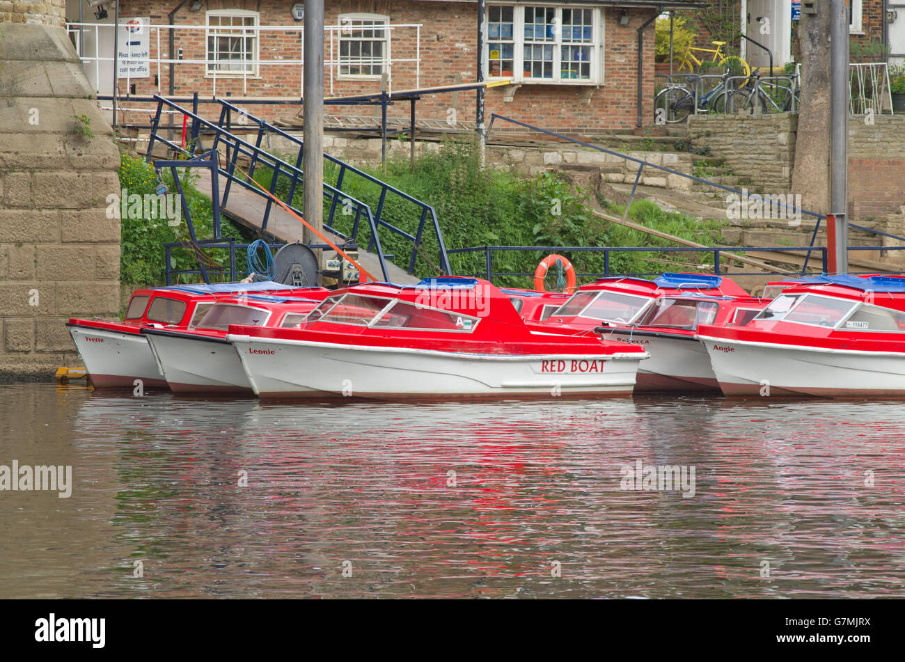 Red hire boats river Ouse York UK Stock Photo