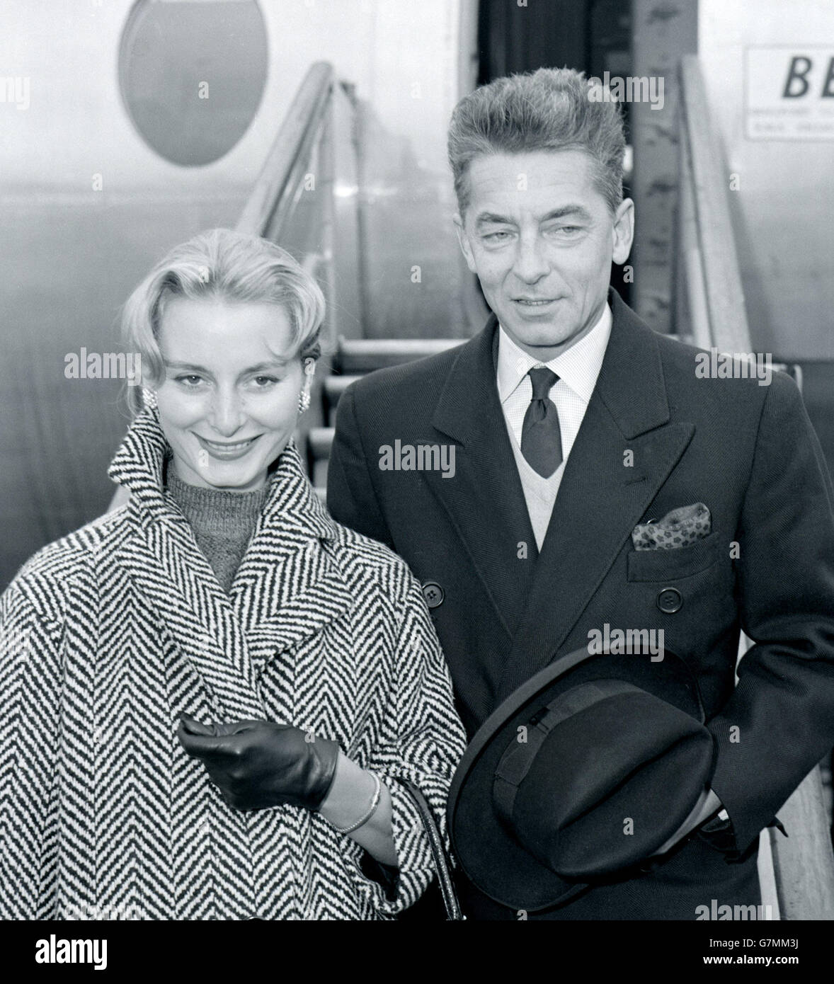 Herbert von Karajan with his bride, former French model Eliette Mouret, on arrival at London Airport. Stock Photo