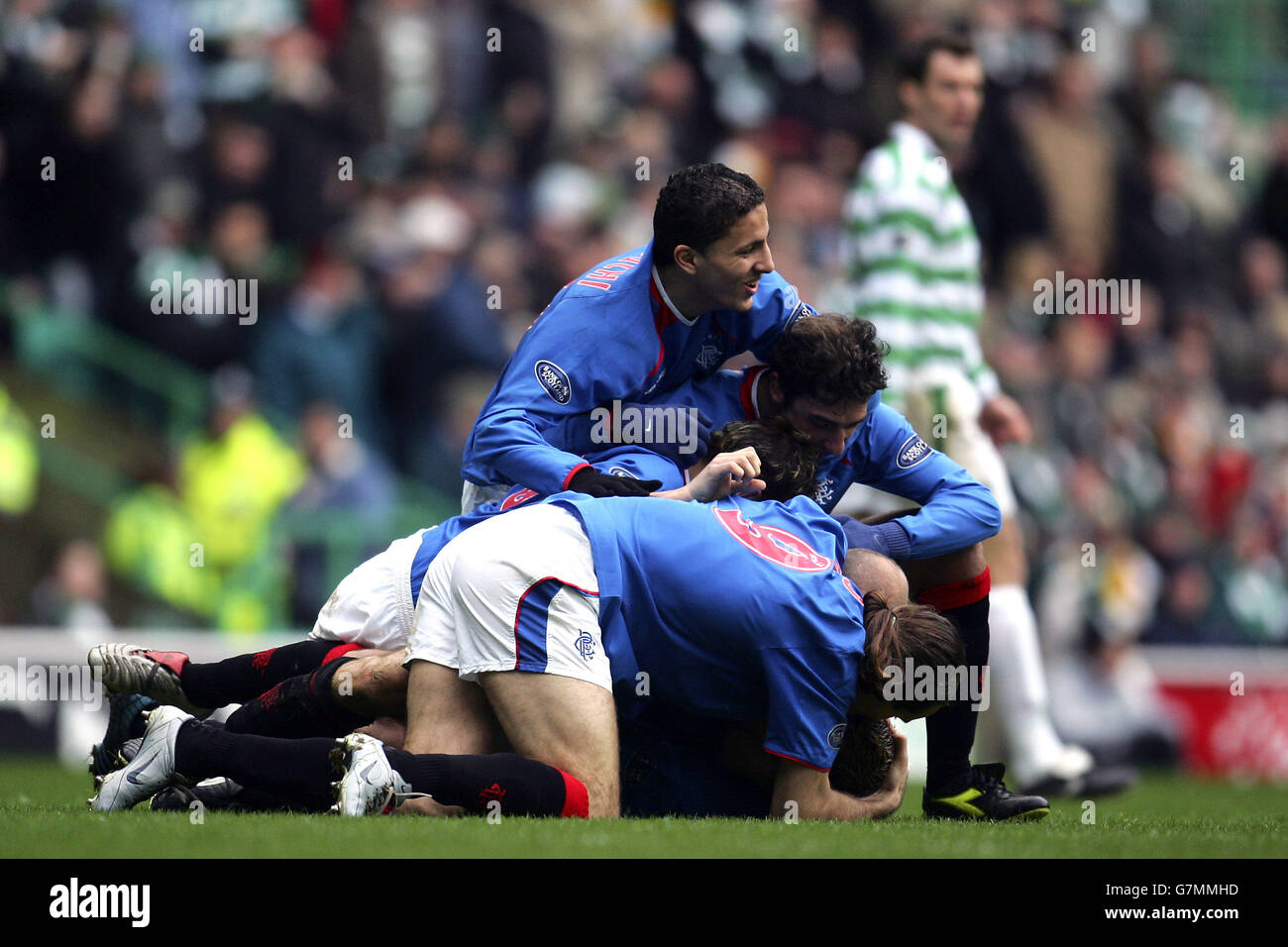 Rangers' players congratulate Fernando Ricksen after he scored the ...