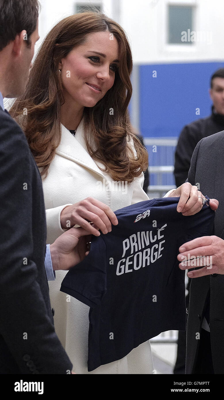 The Duchess of Cambridge, patron of the 1851 Trust, accepts a Ben Ainslie Racing sailing shirt with Prince George written on the back, during a visit to Portsmouth to see the progress of building work on the new home of Ben Ainslie Racing as part of a British America's Cup entry at the Spinnaker Tower in Portsmouth. Stock Photo