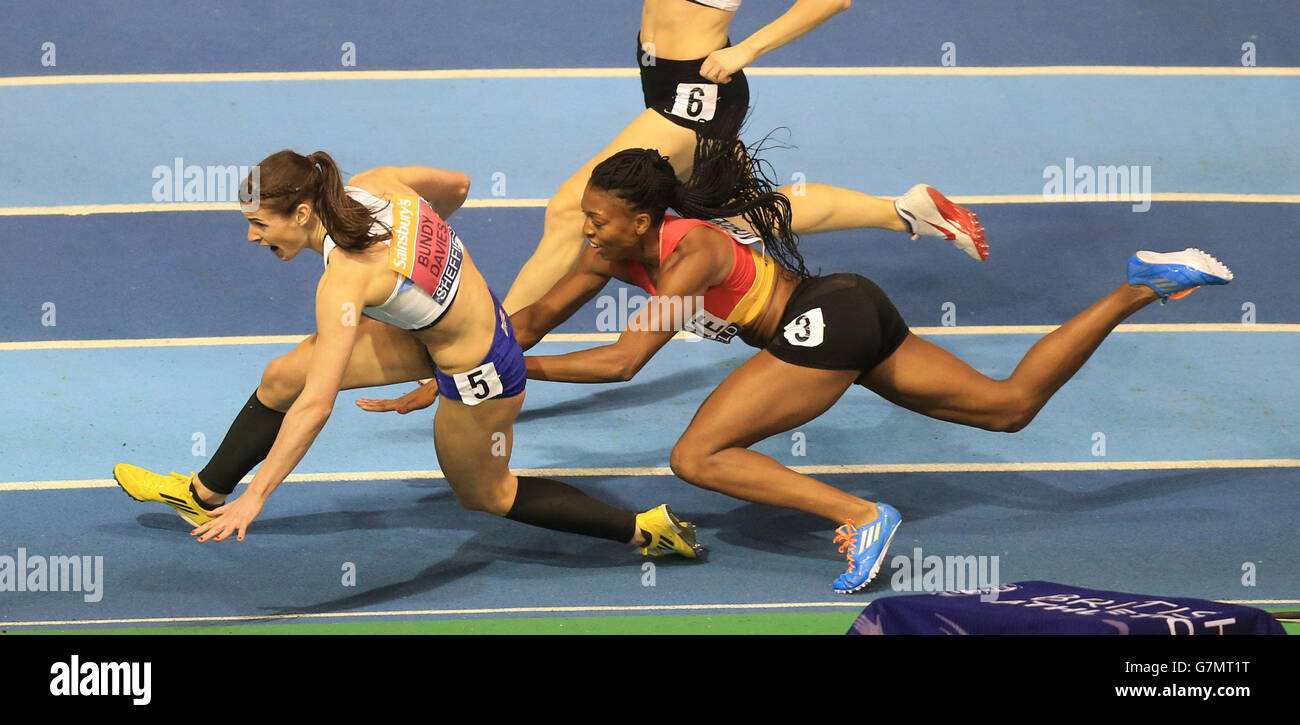 Seren Bundy-Davies and Margaret Adeoye crash out of the Women's 400m final during day two of the Sainsbury's British Indoor Championships at the English Institute of Sport, Sheffield. Stock Photo