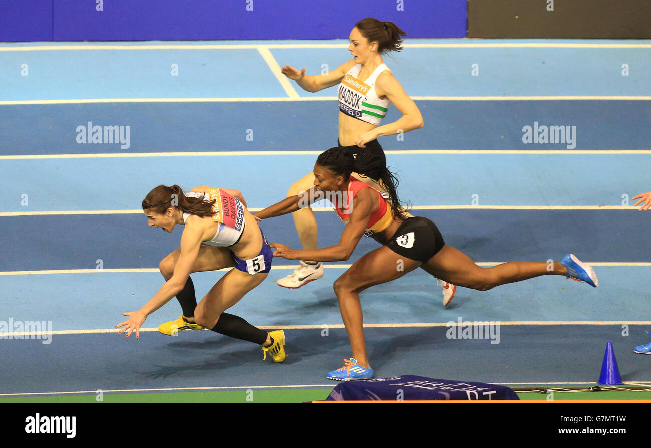 Seren Bundy-Davies and Margaret Adeoye crash out of the Women's 400m final during day two of the Sainsbury's British Indoor Championships at the English Institute of Sport, Sheffield. Stock Photo