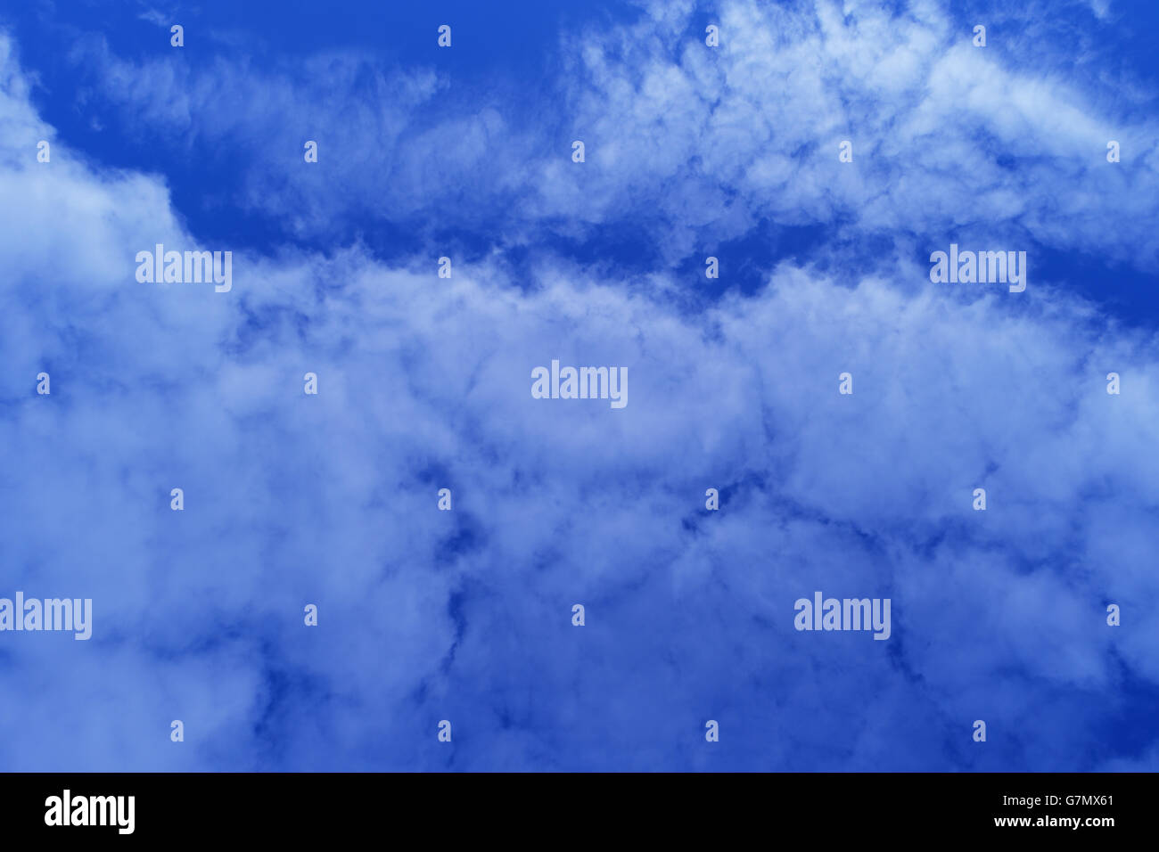 Beautiful white clouds on blue sky background Stock Photo - Alamy