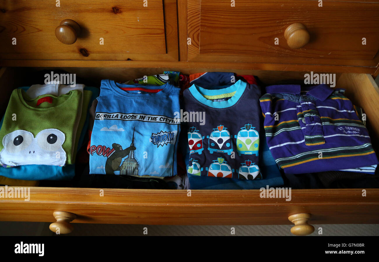 Call to donate children's clothes Stock Photo Alamy