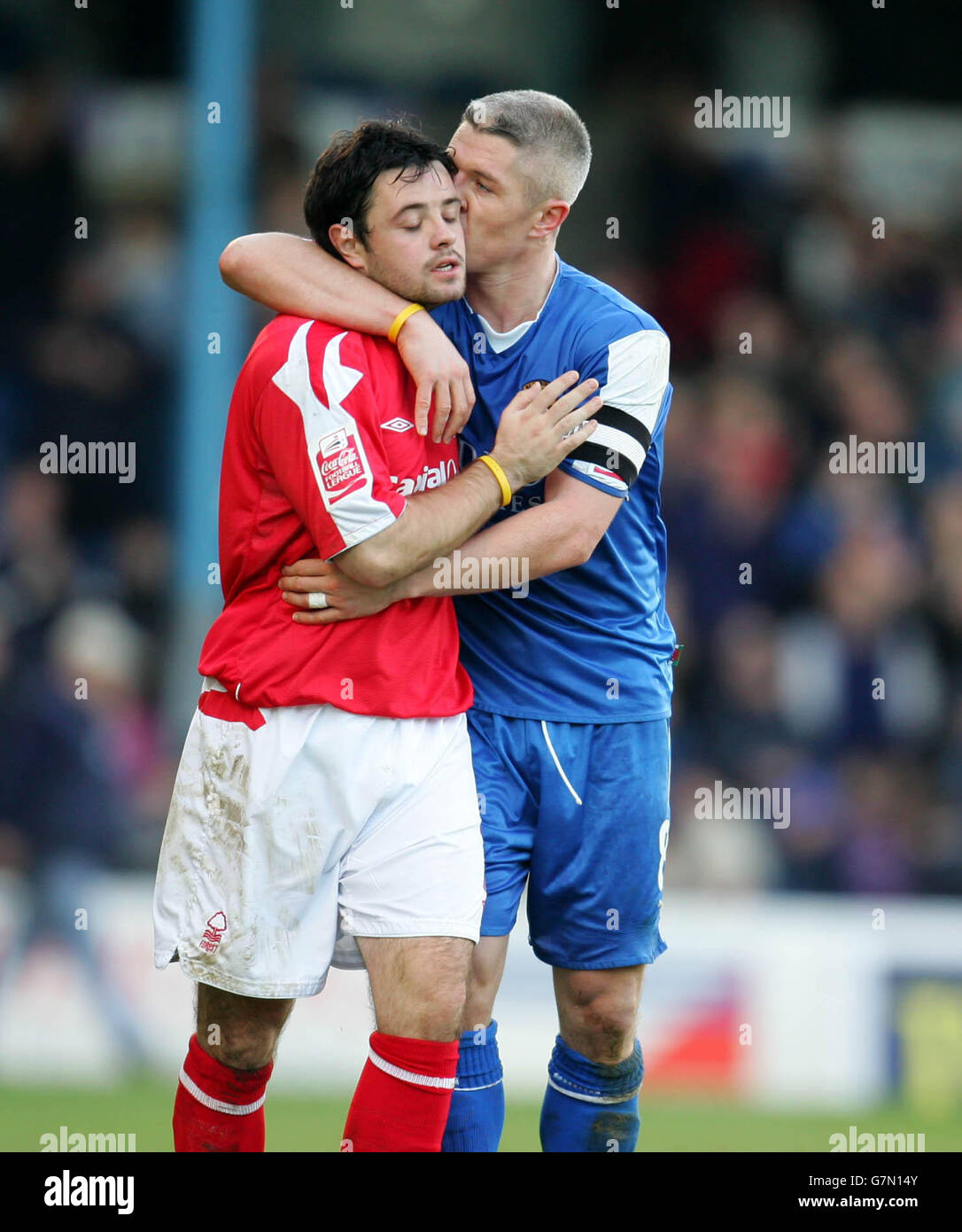 Graham Kavanagh the Cardiff City captain gives Andy Reid the Nottingham ...