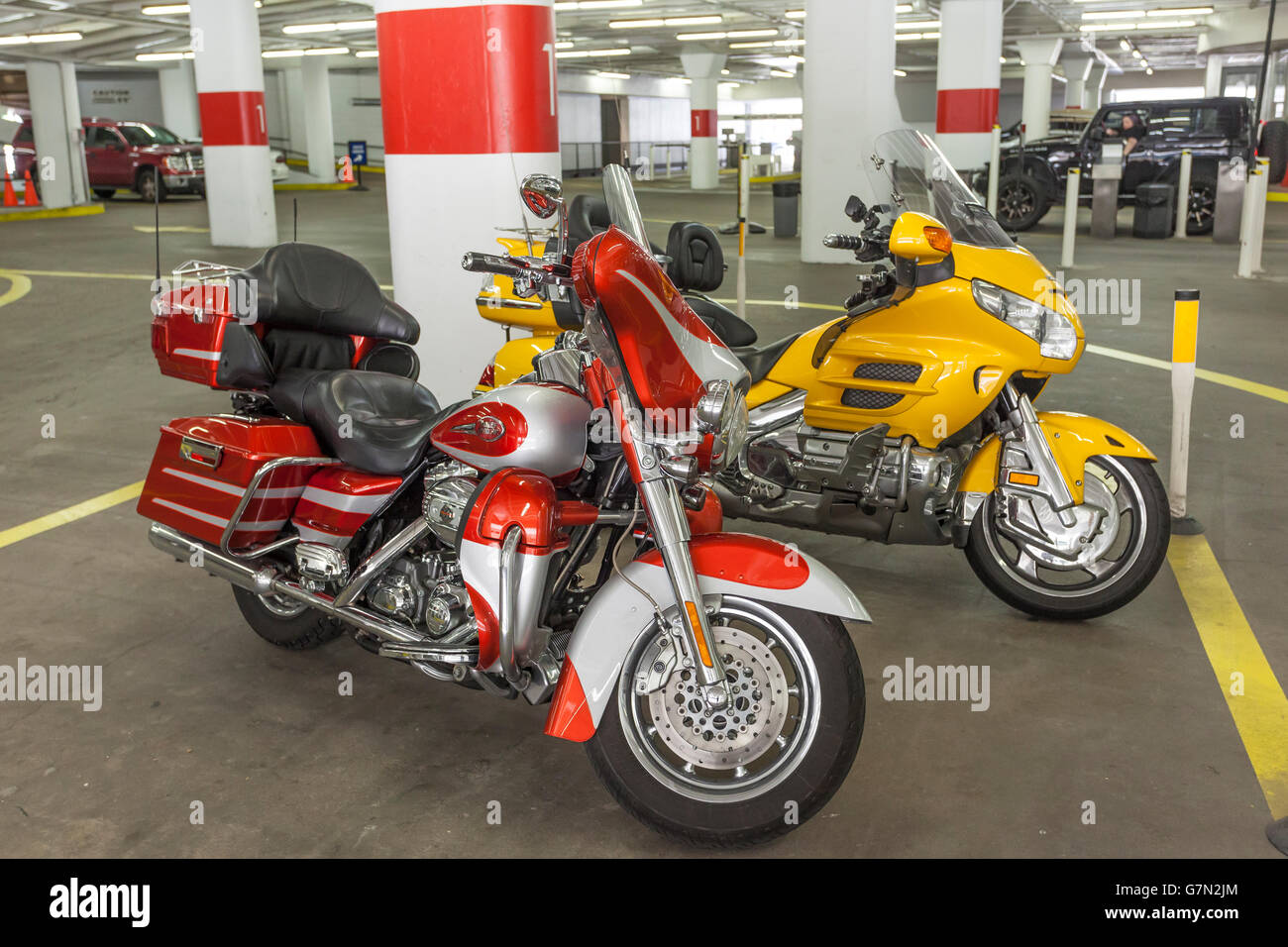 Motorcycles in a parking garage Stock Photo Alamy