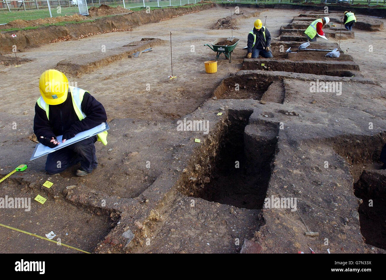 Archaeologists work on a building site where excavation works for a new housing development have unearthed elements of a walled structure over 350m long and 70m wide thought to represent a Roman Chariot racing arena or Roman Circus and is the only verified example of a circus in Britain. Stock Photo