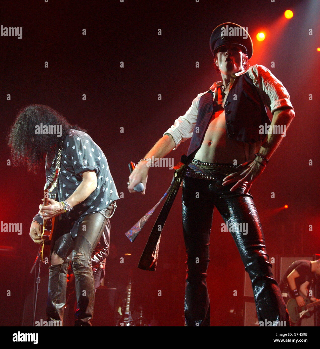 Scott Weiland (right) and Slash of Velvet Revolver perform live on stage. Stock Photo