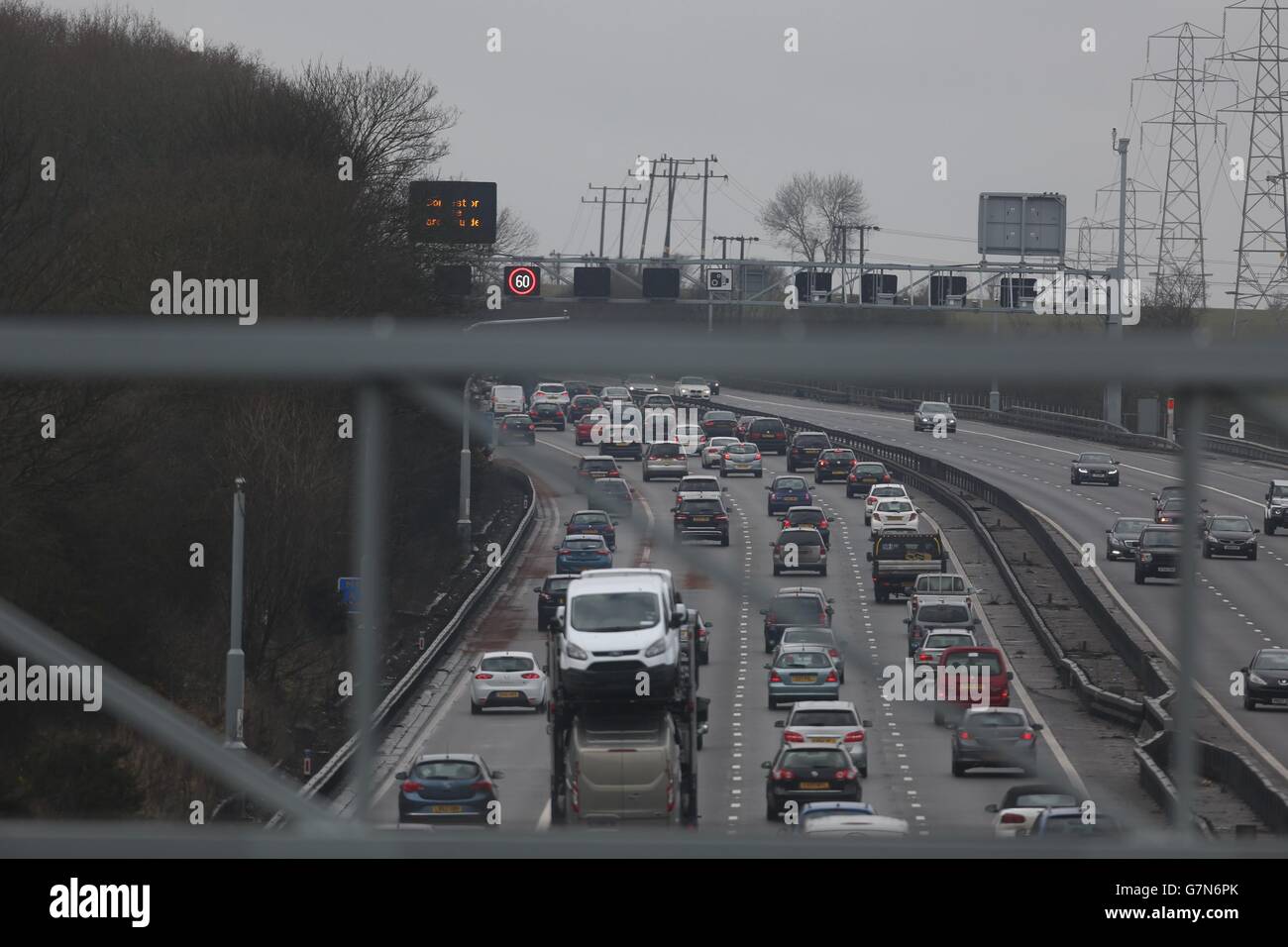 Cars drive along the re-opened M1 motorway after three men were killed when a double-decker coach collided with a stationary car on the M1, police have said. Stock Photo