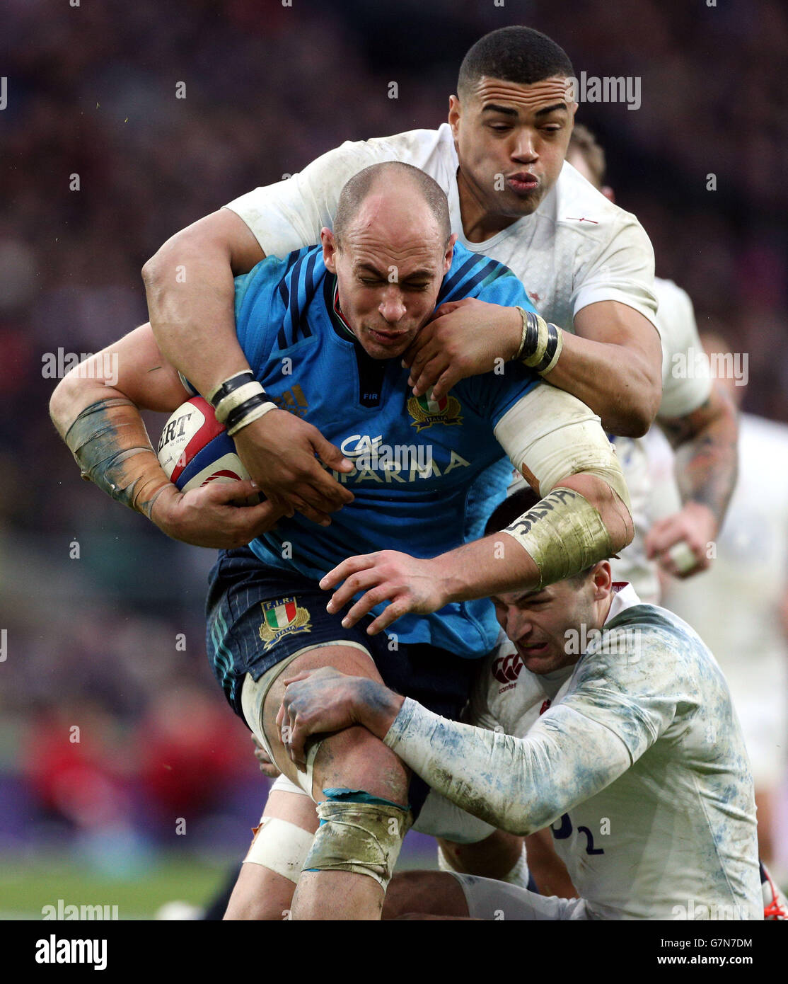 Rugby Union - 2015 RBS Six Nations - England v Italy - Twickenham. Italy's Sergio Parisse is tackled by England's Luther Burrell (above) and Jonny May during the 6 Nations match at Twickenham, London. Stock Photo