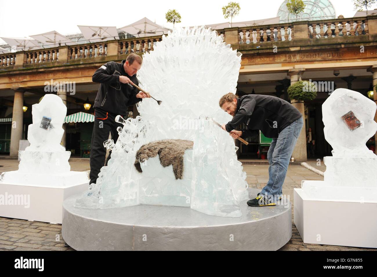 An ice sculpted, life-sized, Iron Throne goes on display in Covent Garden, London, to celebrate the launch of Game of Thrones: The Complete Fourth Season. Stock Photo