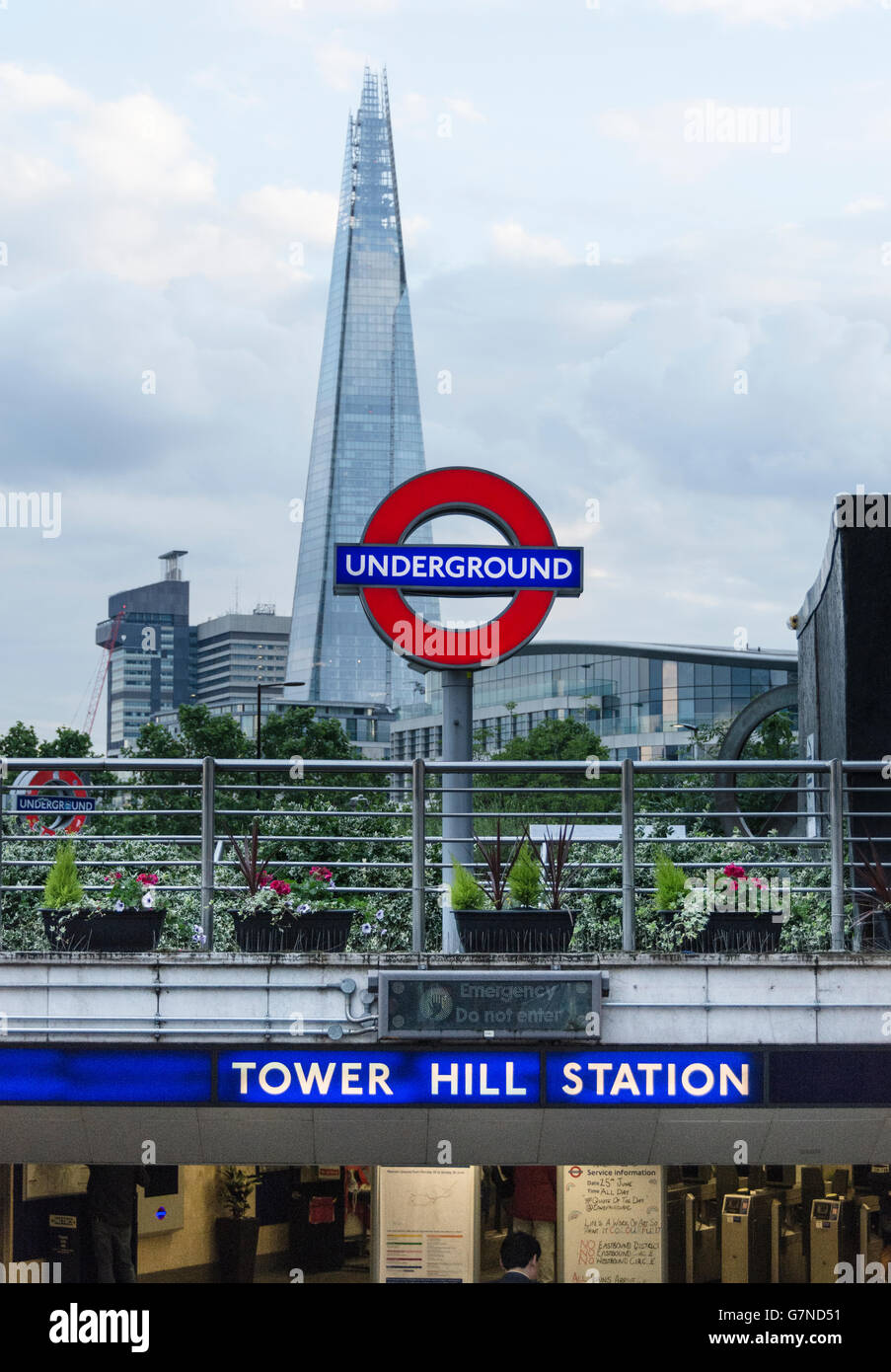 Entrance to Tower Hill Tube Station with TFL roundel and the Shard in