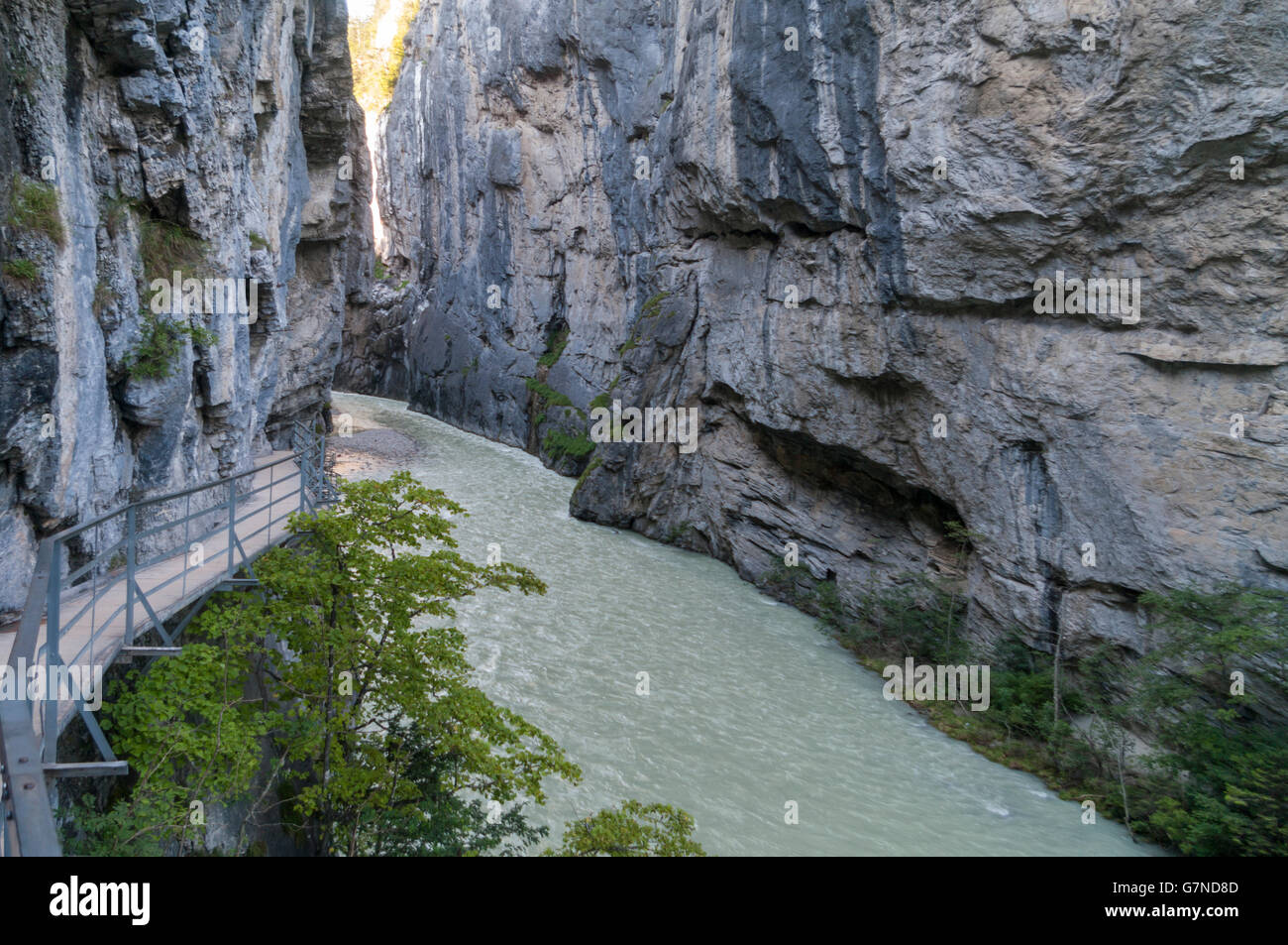 Aareschlucht, a gorge of Aare river carved deep into limestone, with up to 180m high cliff walls. Meiringen, Switzerland. Stock Photo