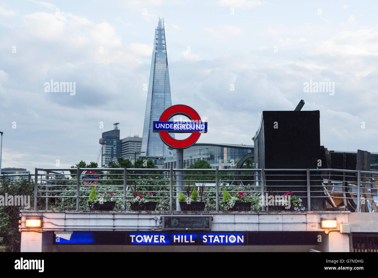 Entrance to Tower Hill Tube Station with TFL roundel and the Shard in
