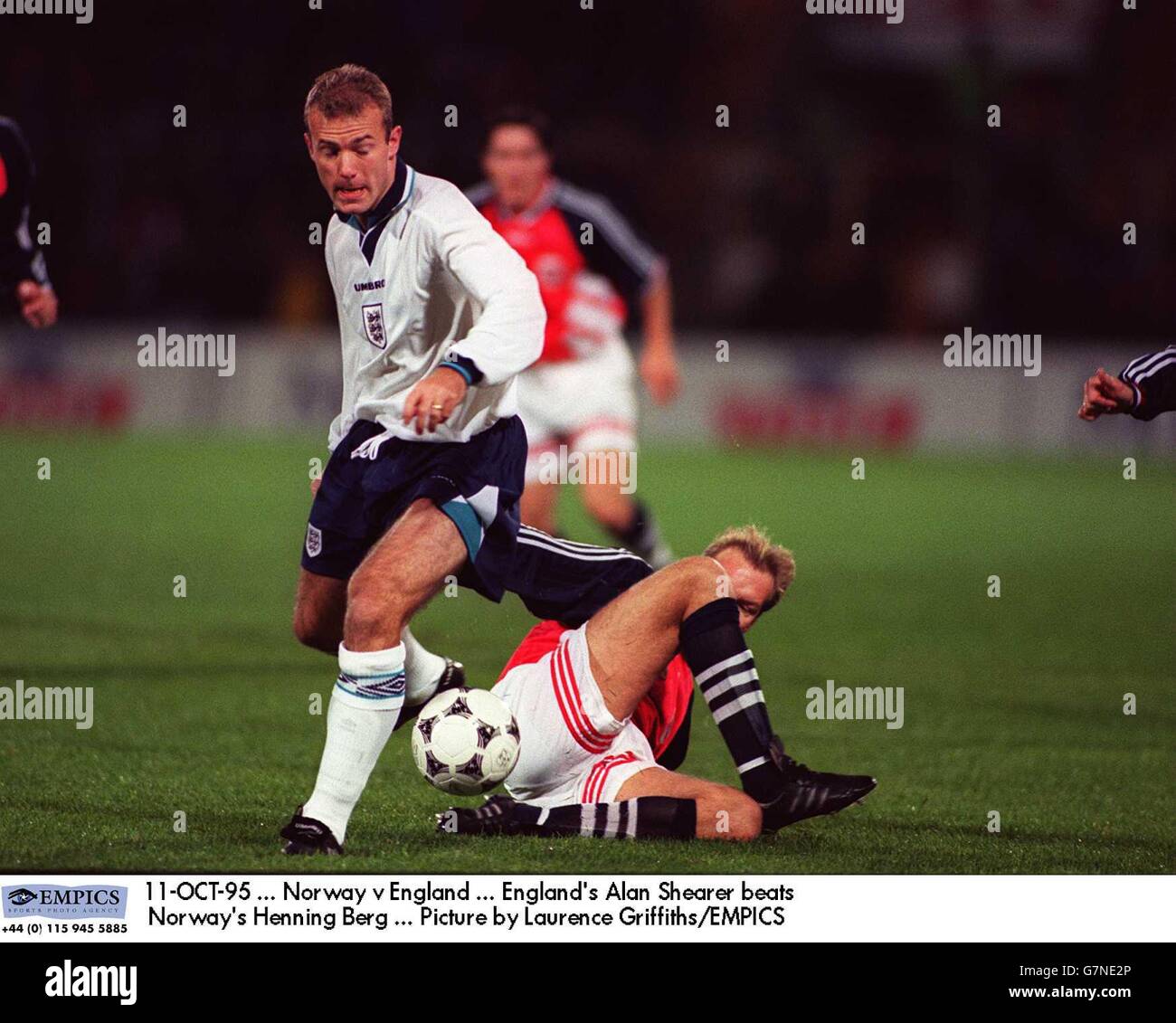 11-OCT-95. Norway v England. England's Alan Shearer beats Norway's Henning Berg. Picture by Laurence Griffiths/EMPICS Stock Photo