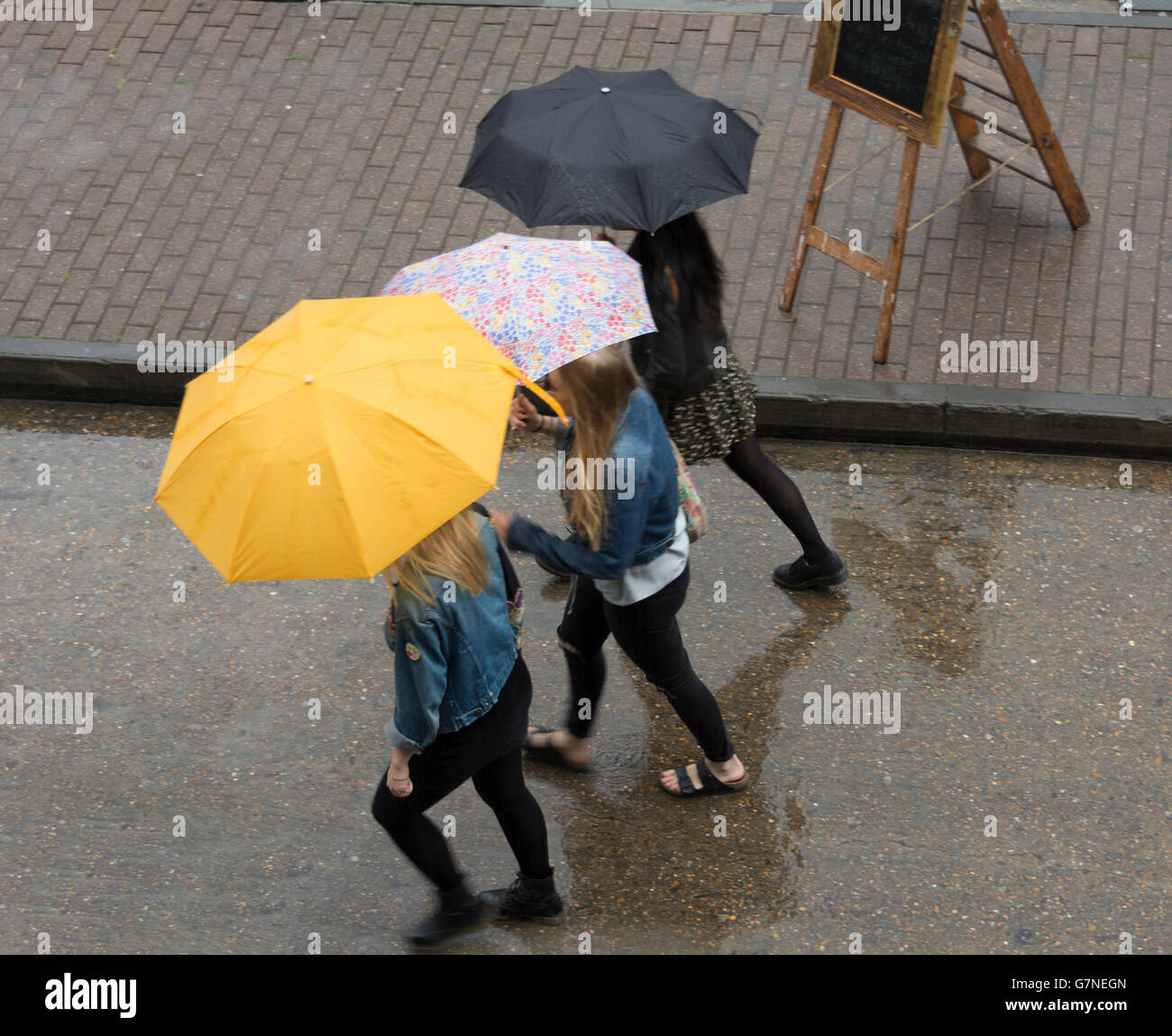 Birds eye view people with umbrellas High Resolution Stock Photography