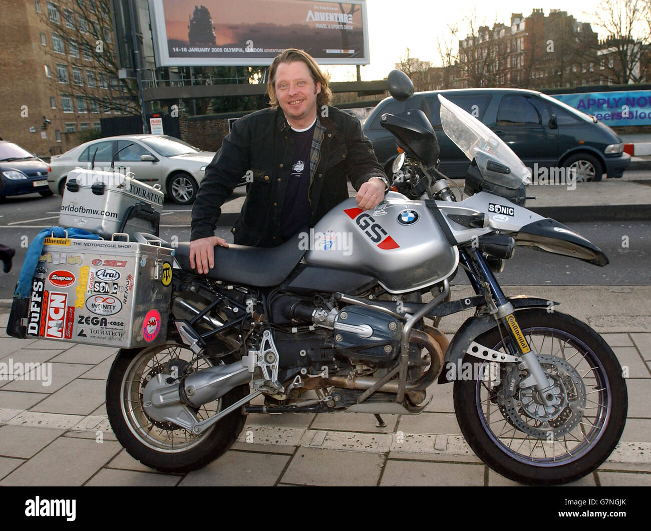 Round-the-World motorcyclist, Charley Boorman with one of the three BMW R1150GS  Adventure bikes contributed to Boorman and his riding partner Ewan  McGregor, by BMW, for their epic documentary trip "Long Way Round