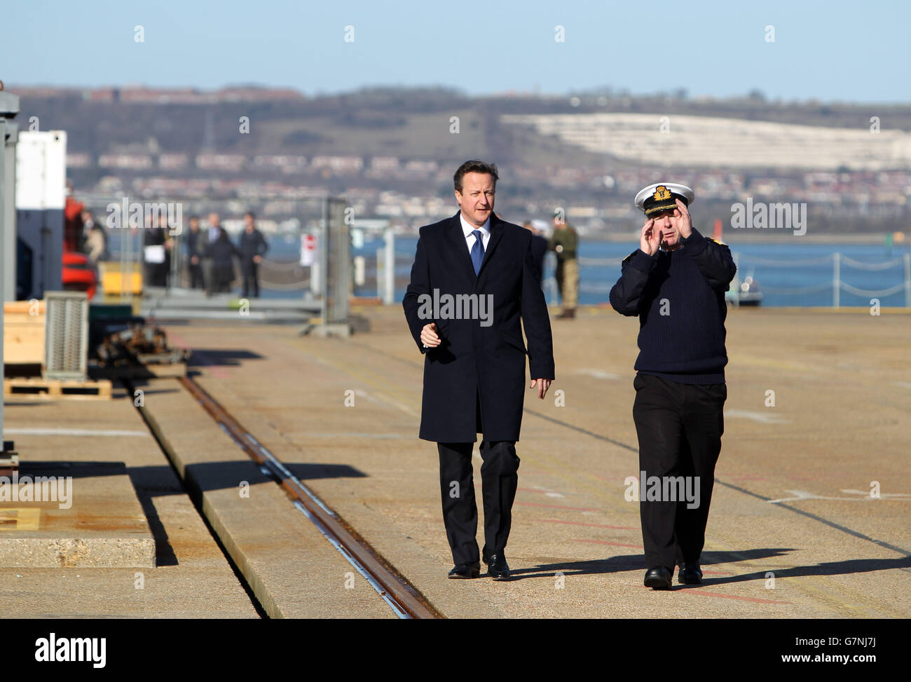 Prime Minister David Cameron and base commander Commodore Jeremy Rigby ...