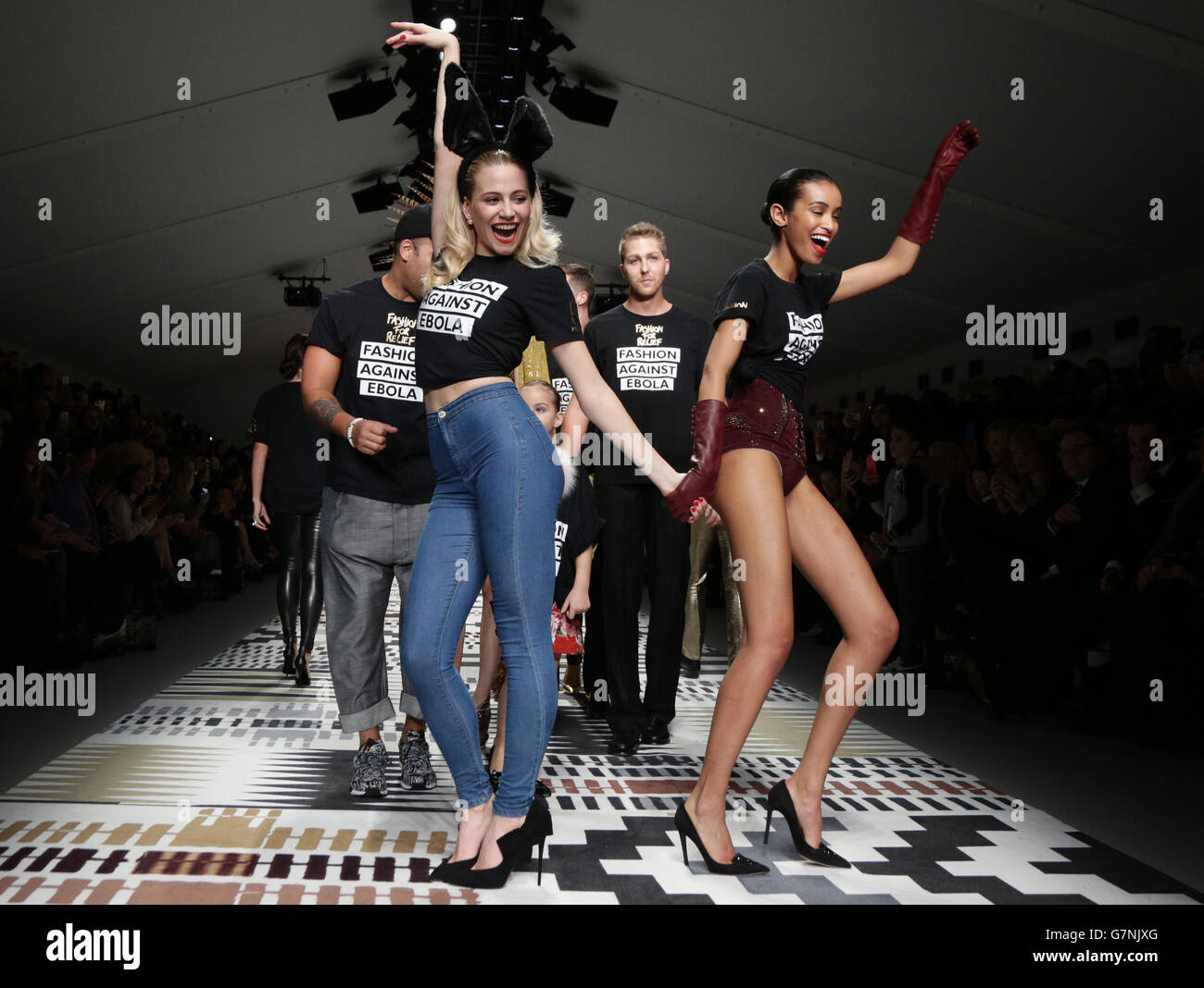 Pixie Lott (left) on the catwalk during the Fashion for Relief a