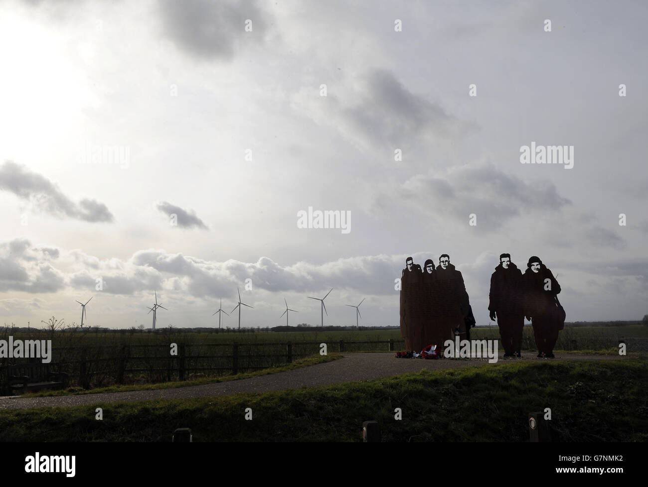 STANDALONE Photo. A wind farm on the old wartime airfield at Lissett in East Yorkshire, a backdrop to a memorial to the 851 bomber crew from 158 Squadron who died on active service, who were based at the Bomber Command airfield in World War Two. Stock Photo