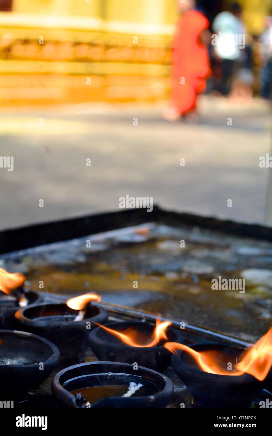 oil burners at gangaramaya temple in colombo sri lanka Stock Photo