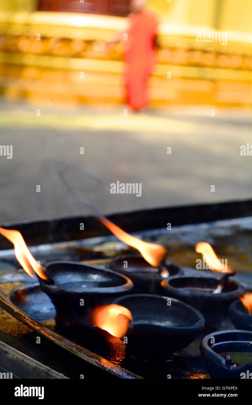 oil burners at gangaramaya temple in colombo sri lanka Stock Photo