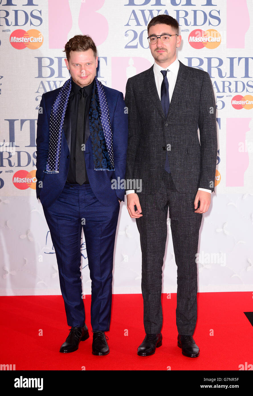 Joe Newman and Gus Unger-Hamilton of Alt-J arriving for the 2015 Brit Awards at the O2 Arena, London. PRESS ASSOCIATION Photo. Picture date: Wednesday February 25, 2015. See PA story SHOWBIZ Brits. Photo credit should read: Dominic Lipinski/PA Wire Stock Photo