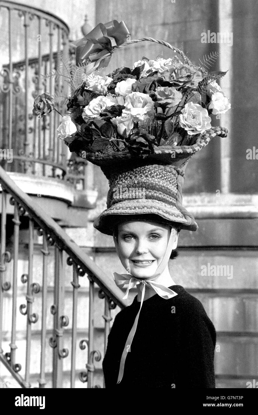 An Easter bonnet called the 'Rose Basket' is given first prize in the Mad Hats section of the annual Easter bonnet competition organised by the London Tourist Board. Dianne Boles in modelling the creation. Stock Photo