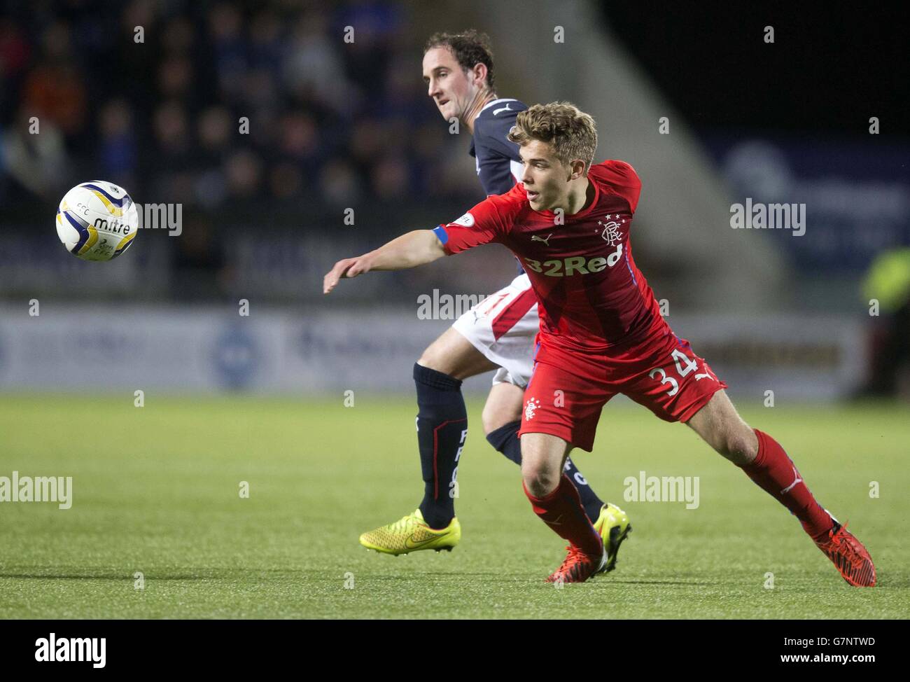 Rangers' Andrew Murdoch and Falkirk's Mark Kerr battle for the ball during the Scottish Championship match at Falkirk Stadium, Falkirk. Stock Photo