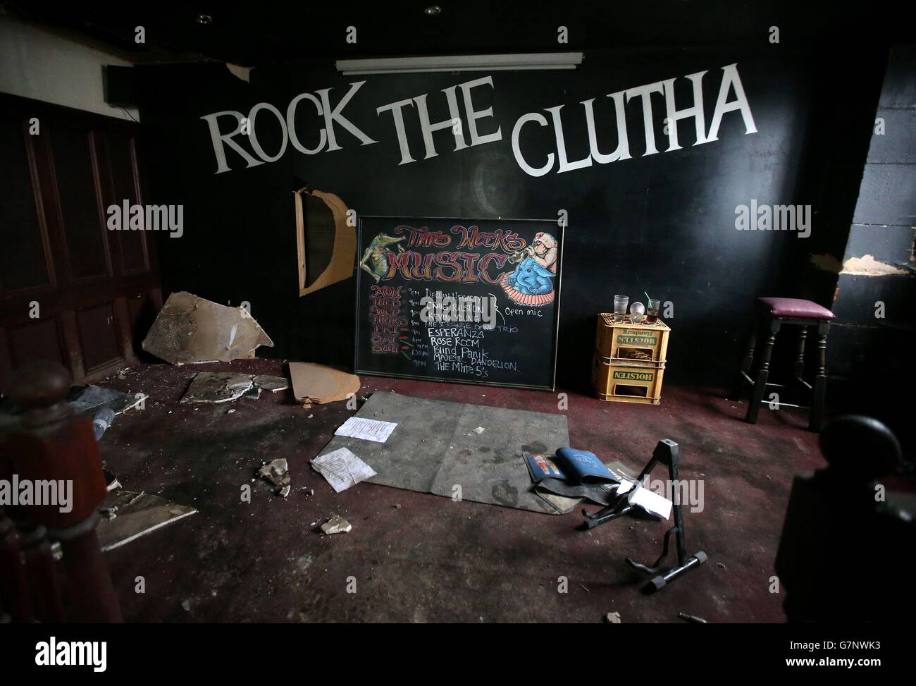 The stage at the Clutha bar in Glasgow with the band's drinks and instrument stand still there after a police helicopter crashed into the bar, claiming ten lives in November 2013, building work begins today at the pub, which has been left largely untouched since the night of the tragedy. Stock Photo
