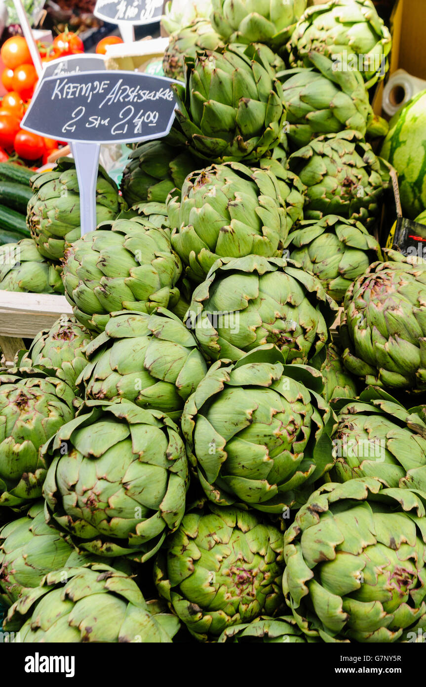 Globe artichokes for sale at a Danish market stall Stock Photo