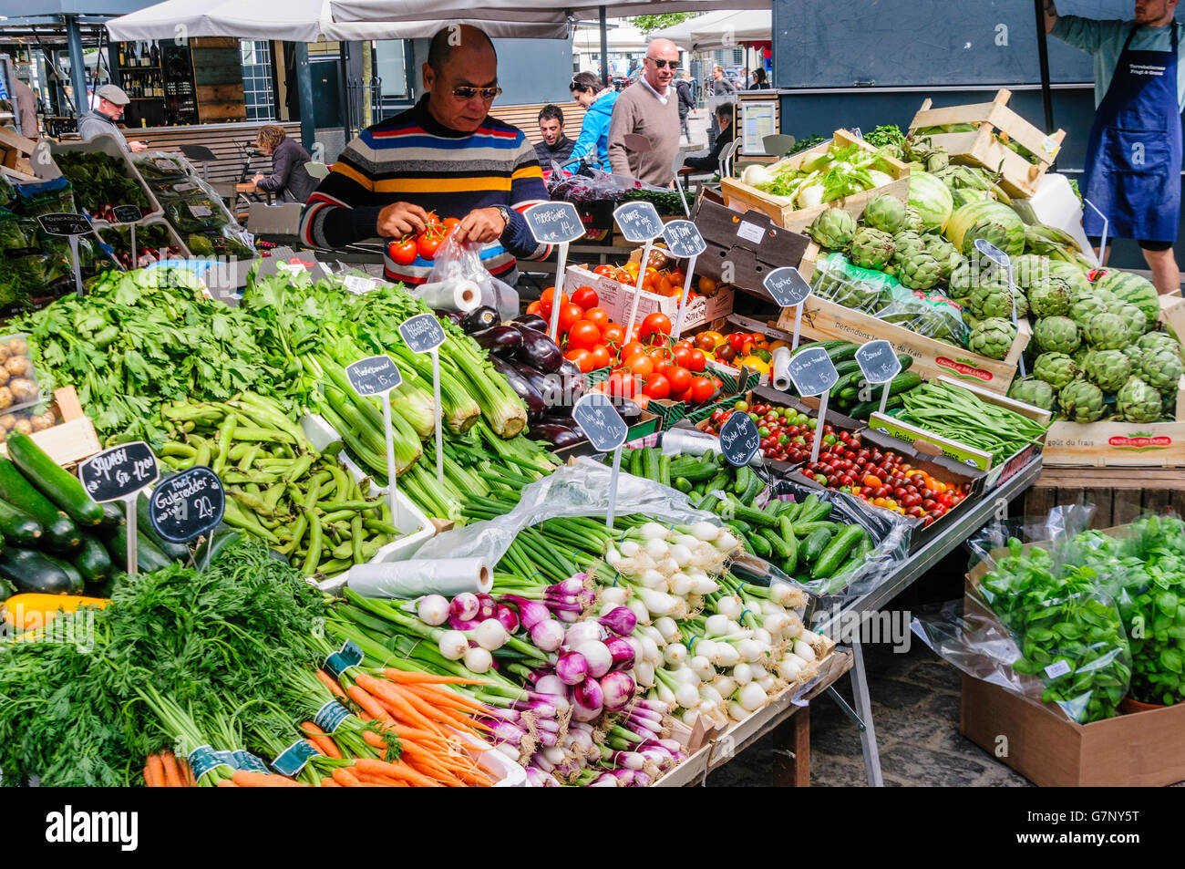 Vegetables for sale at an outdoor market stall Stock Photo