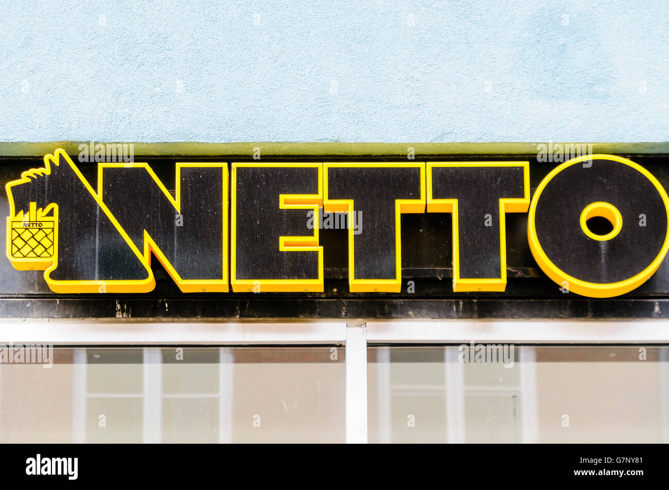 Sign for Netto, a Denmark based supermarket chain, with their Scottish Terrier logo Stock Photo