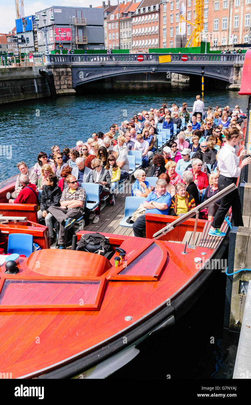 Canal boat with tourists ready to set off on a tour, Copenhagen, Denmark Stock Photo