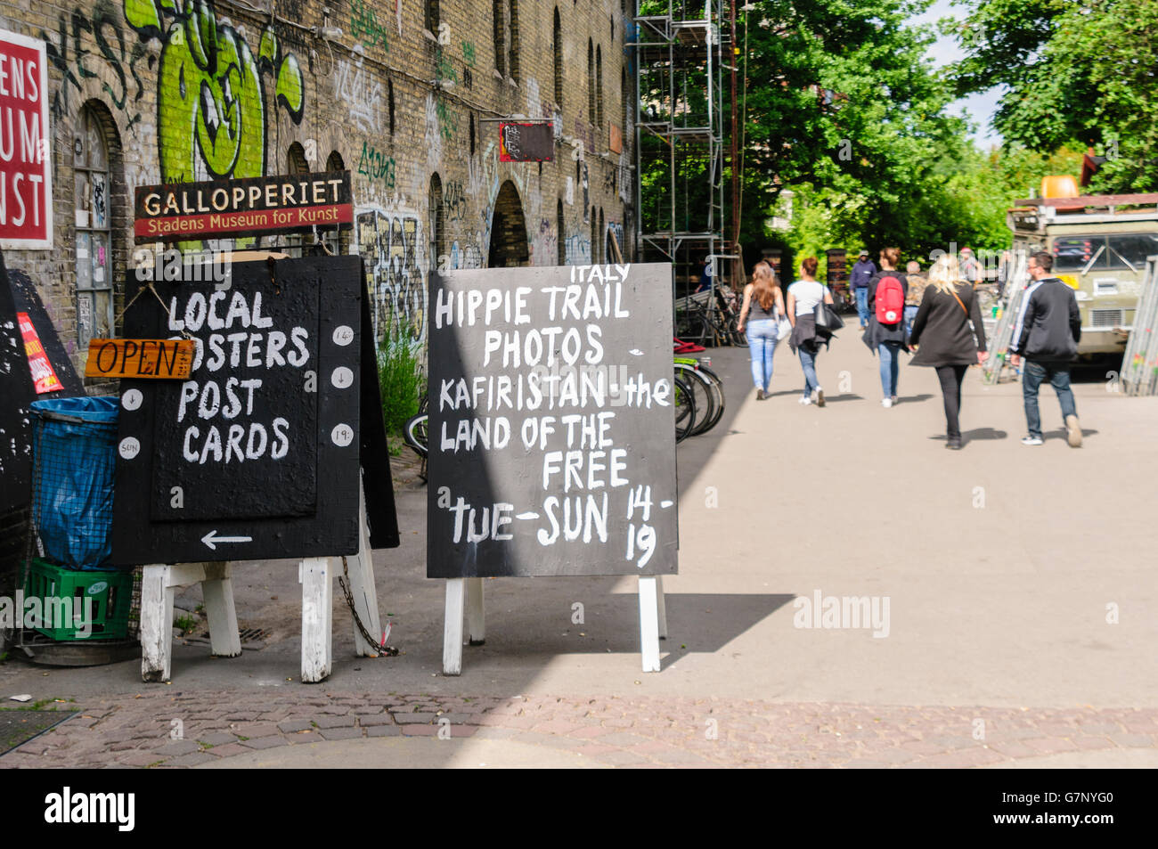 Signs outside the museum, tourist centre and shops in Freetown Christiania, Copenhagen Stock Photo