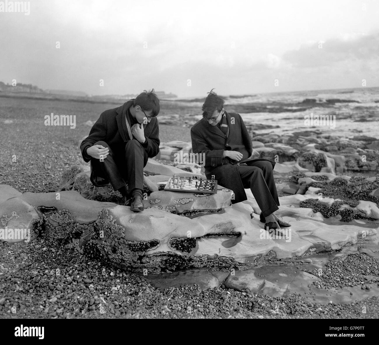 Martin Hugins, from Manchester, and David Oakes, from Wilmslow, Manchester, practising chess on the beach at Hastings ahead of the tournament. Stock Photo