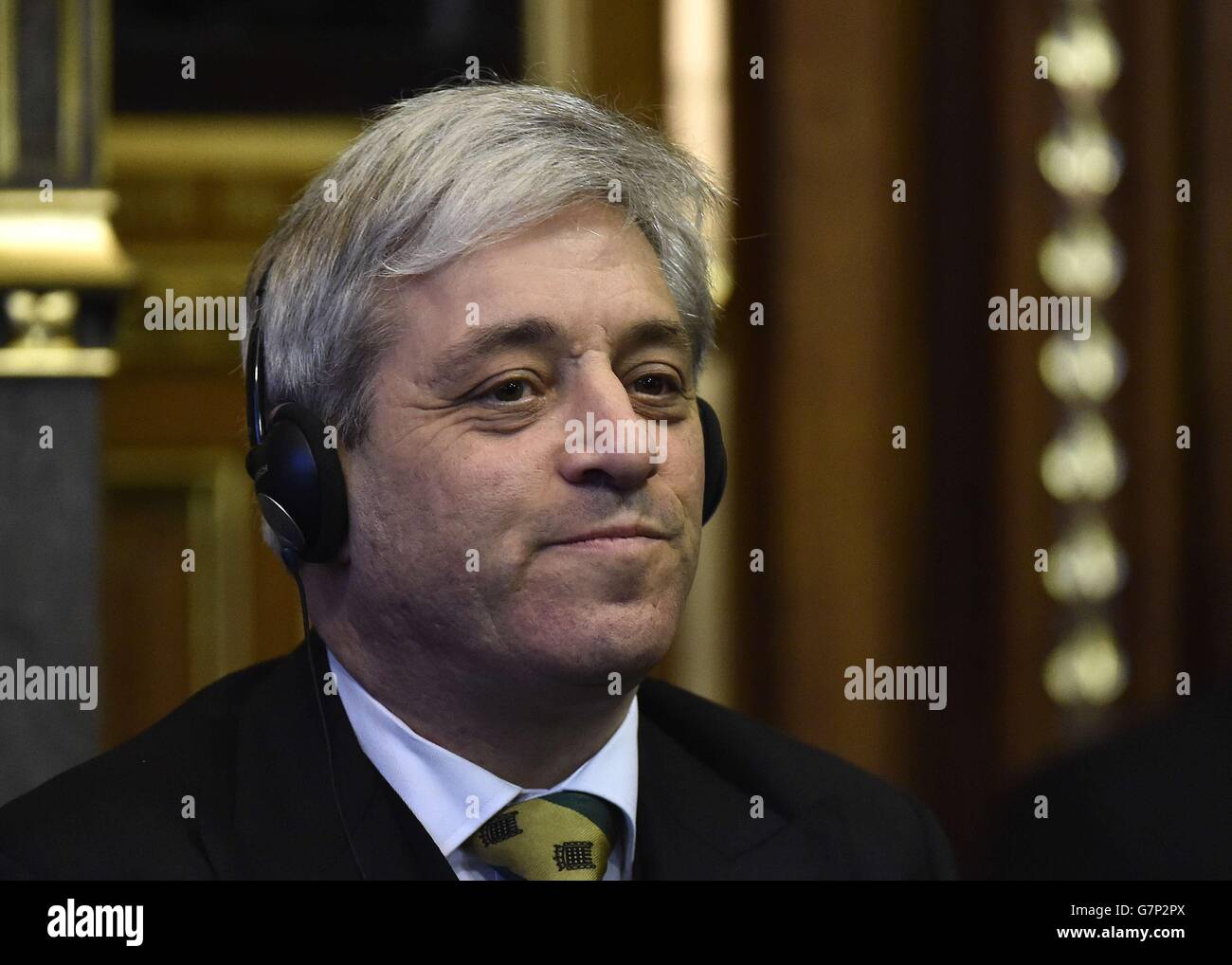John Bercow, the Speaker of the House of Commons listens as Mexico's President Enrique Pena Nieto delivers an address to members of the British All-Party Parliamentary Group at the Houses of Parliament in London. The President and his wife are guests of Queen Elizabeth II during their three day state visit to Britain. Stock Photo