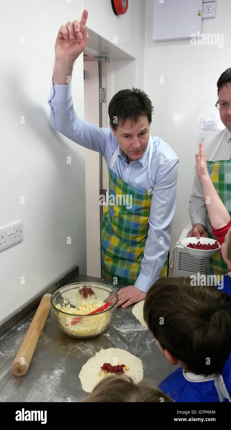 Deputy Prime Minister Nick Clegg making Cornish pasties during a visit St Merryn school in north Cornwall. Stock Photo