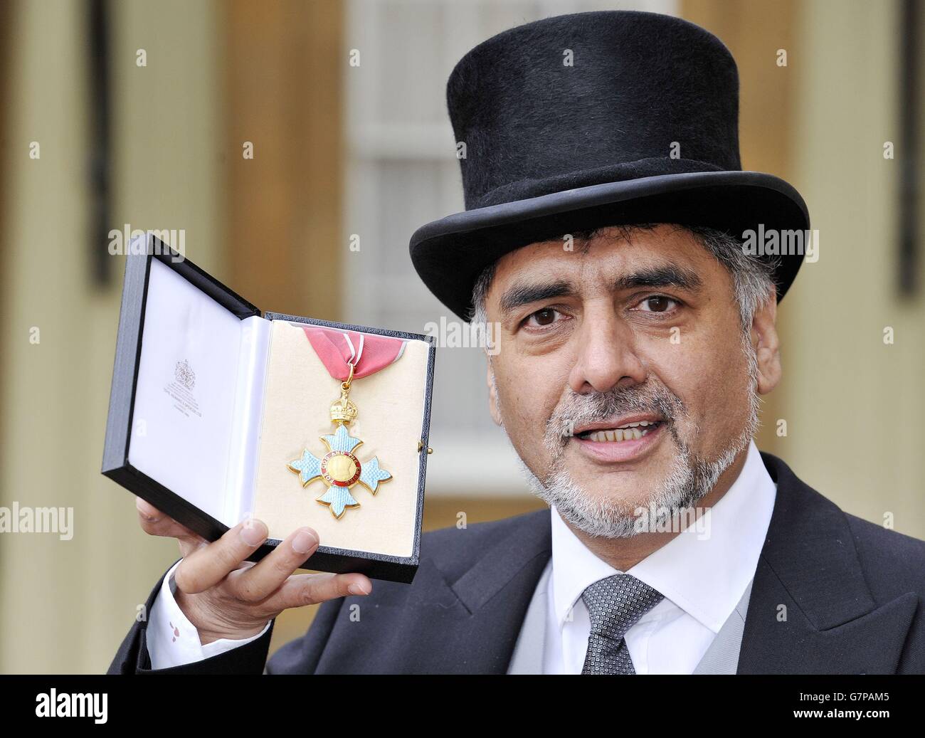 James Caan, holds his Commander of the Order of the British Empire (CBE