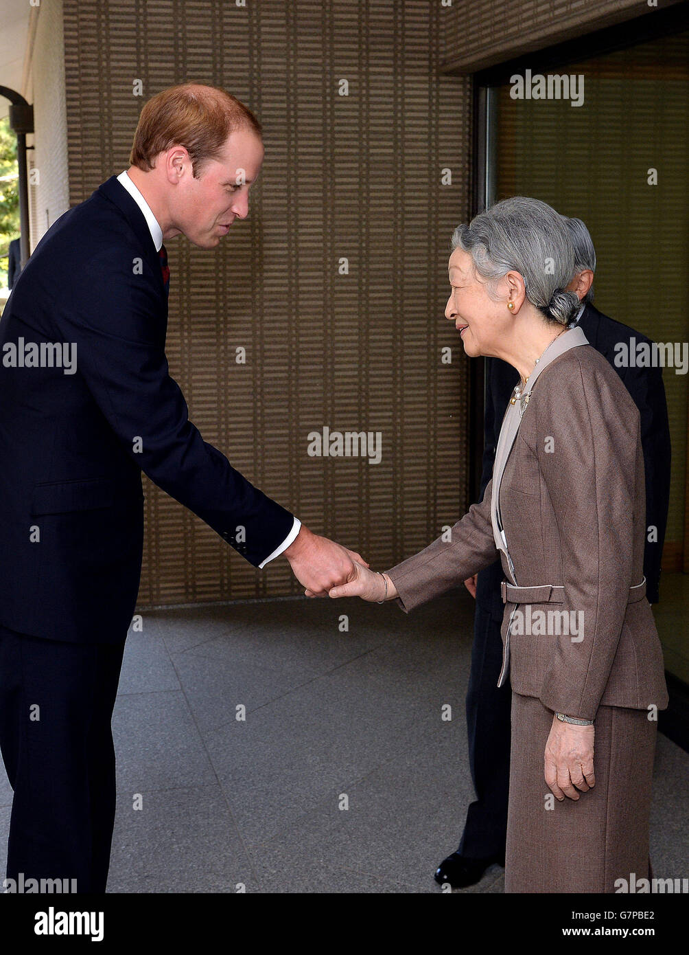 The Duke of Cambridge bows as he shakes hands with Empress Michiko, after he arrived for lunch with the Emperor and his wife at the couple's residence within the Royal Palace grounds in central Tokyo, during the second day of his trip to Japan. Stock Photo