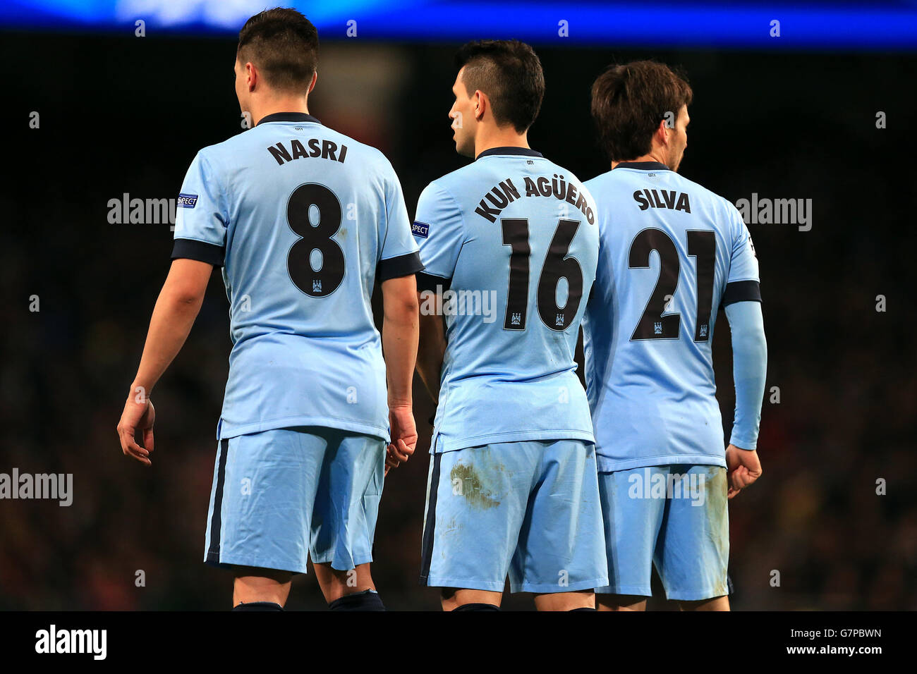 Soccer - UEFA Champions League - Round of 16 - First Leg - Manchester City v Barcelona - Etihad Stadium. L-R: Manchester City's Samir Nasri, Sergio Aguero and David Silva form a defensive wall Stock Photo