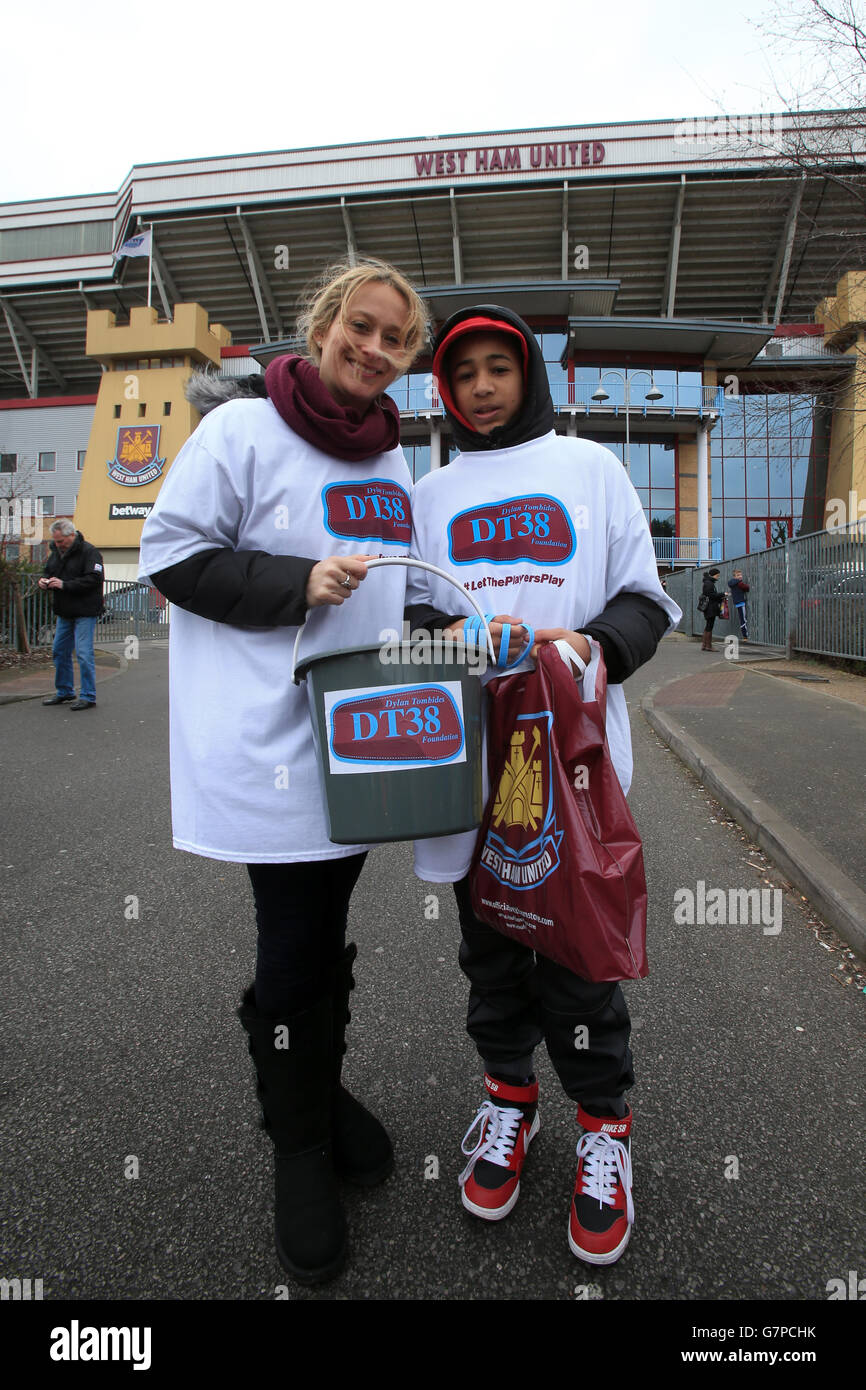 Members of the DT38 Foundation in memory of former West Ham player Dylan Tombides outside Upton Park before the Barclays Premier League match at Upton Park, London. PRESS ASSOCIATION Photo. Picture date: Saturday February 28, 2015. See PA story SOCCER West Ham. Photo credit should read: Nick Potts/PA Wire. Stock Photo