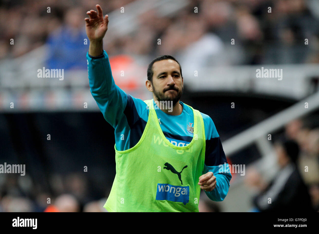 Newcastle United's Jonas Gutierrez warms up during the Barclays Premier League match at St James' Park, Newcastle. Stock Photo