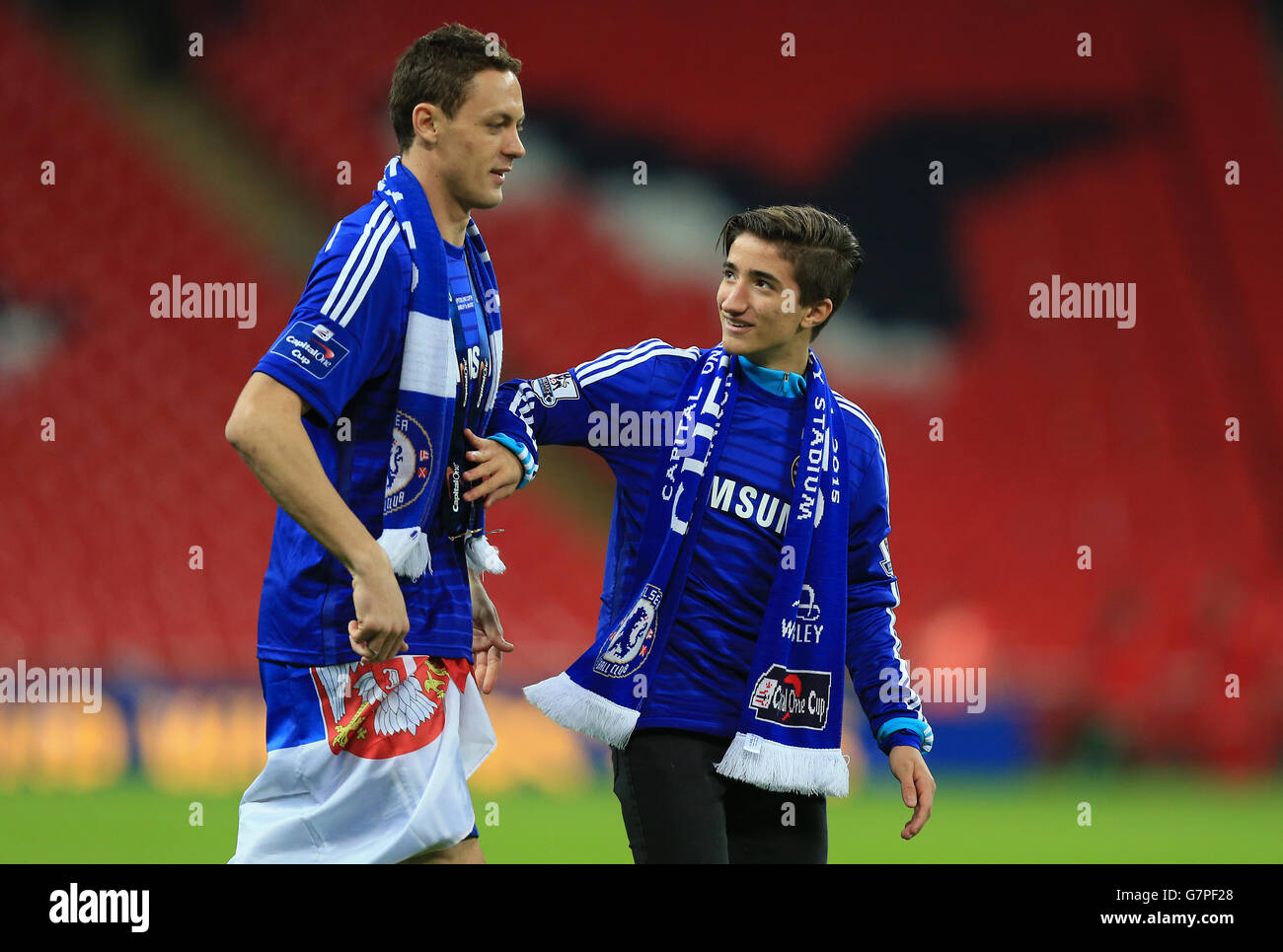 Chelsea's Nemanja Matic (left) with Chelsea manager Jose Mourinho's Son, Jose Mario Mourinho Jr. (right). Stock Photo