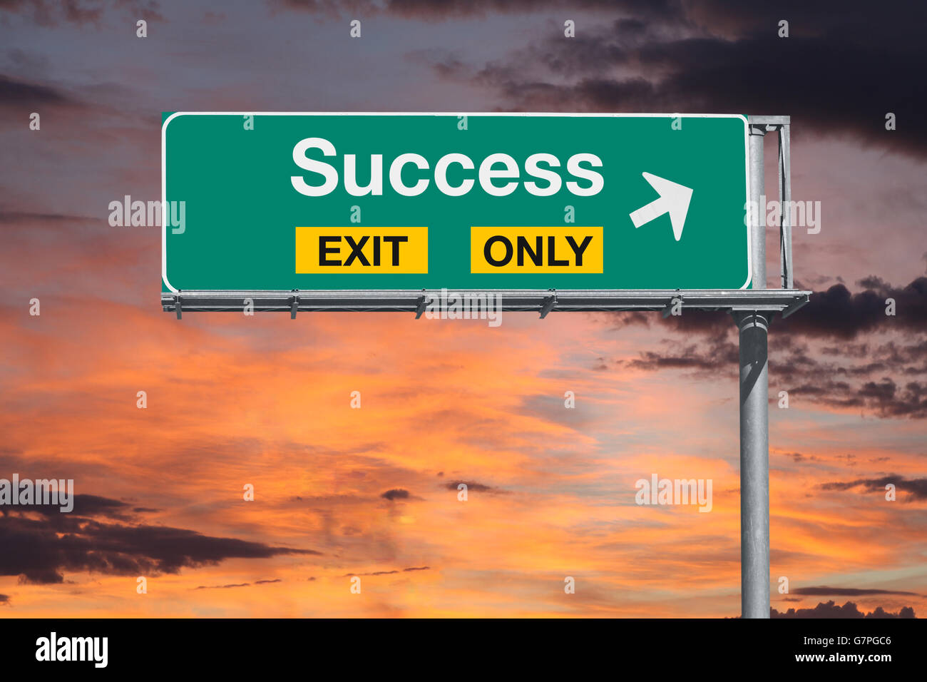 Success exit only highway sign with sunrise sky. Stock Photo