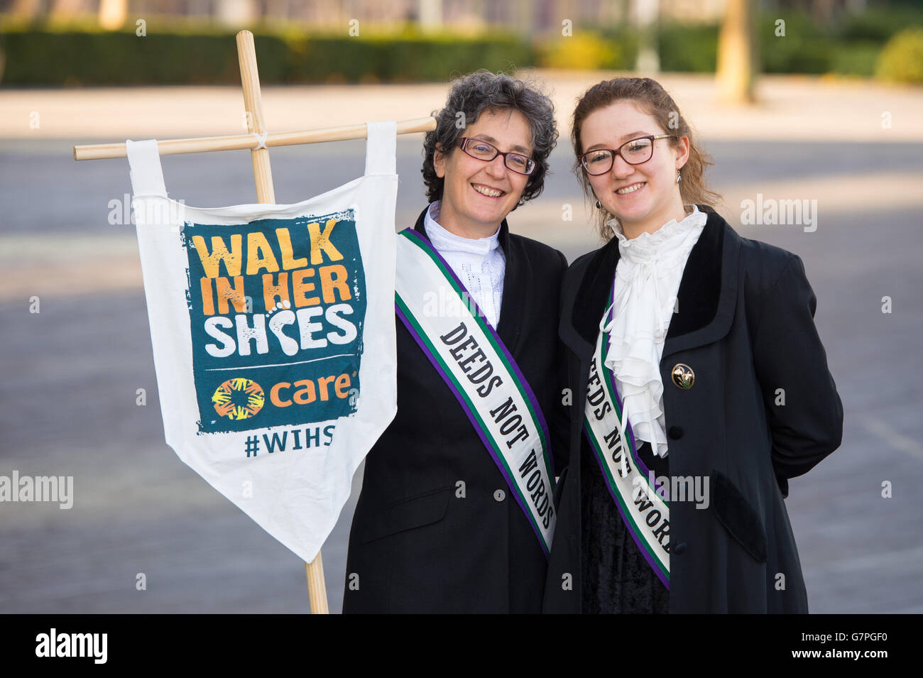 The great-granddaughter of Emmeline Pankhurst, Dr Helen Pankhurst (left) and her daughter Laura take part in CARE International's Walk in Her Shoes march in central London, to mark International Women's Day. Stock Photo