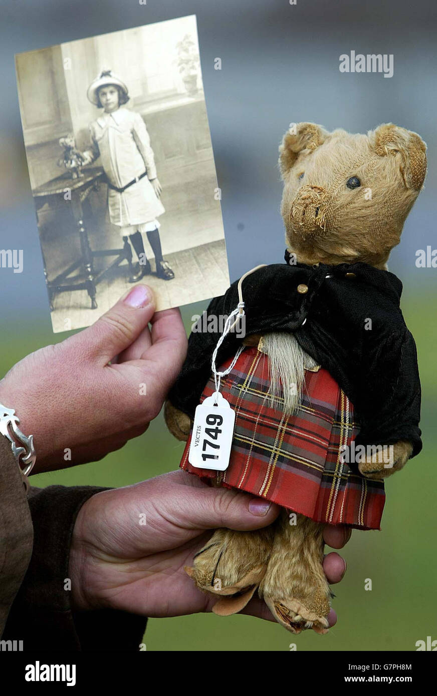 A 'Scottish' teddy bear, that belonged to an orphan of the 1908 Tsumami that devastated both Messina in Sicily and Reggio Calabria in Italy is to be auctioned of by Vectis. Stock Photo