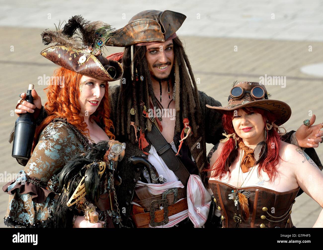 (left to right) Steam Pirate, Captain Jack Sparrow, and Steam Punk at the ExCel centre, to promote the Super Comic Convention which takes place next weekend, at the venue in Docklands, east London. Stock Photo