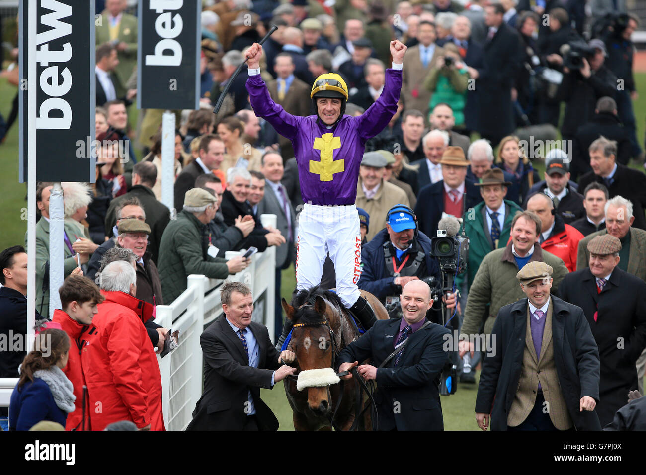 Winning jockey Davy Russell celebrates victory in the Neptune